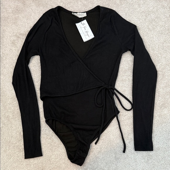 audrey Tops - NWT Audrey L ballet cross front bodysuit